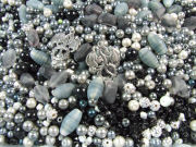 Bastelperlen f�deln