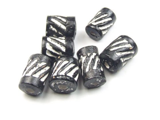 Tonperle 'Jingala Tanda', 7x6 mm, schwarz-wei